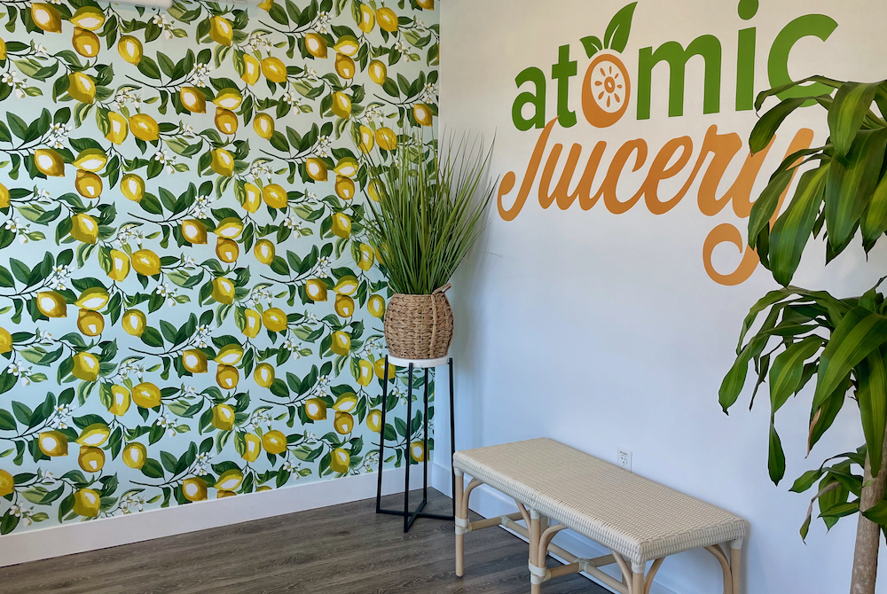 inside of juicery with plants and lemon decor